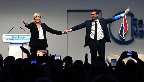 Jordan Bardella, next to French far-right party Rassemblement National (RN) parliamentary group leader Marine Le Pen. (Photo | AFP)
