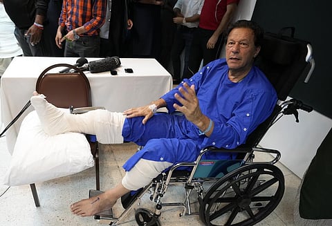 Former Pakistani Prime Minister Imran Khan speaks during a news conference in Shaukat Khanum hospital, where is being treated for a gunshot wound in Lahore, Pakistan, Nov. 4, 2022. (Photo | AP)