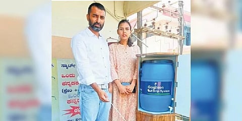 Santosh and Deepika Shet with the water tank designed for balconies and the smart device