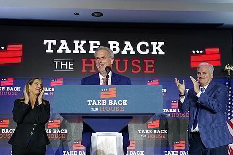 House Minority Leader Kevin McCarthy, speaks at an election event, in Washington, as RNC chair Ronna McDaniel, (L), and GOP Rep. Tom Emmer, listen, Nov. 9, 2022. (Photo | AP)