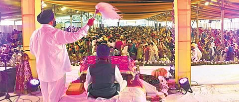 Thousands of Sikh devotees congregate at the Nampally Exhibition Grounds to celebrate 553rd Prakash Utsav on Tuesday