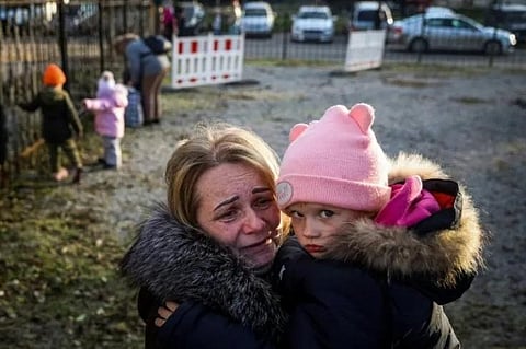 'We fled because eight guys with automatic rifles came to our house,' said Svetlana Titova, 52. (Photo | AFP)