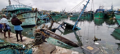 Hundreds of fishing boats at Kasimedu fishing harbour were damaged after cyclone Mandous hit the Chennai coast. (Express Photo | P Jawahar)