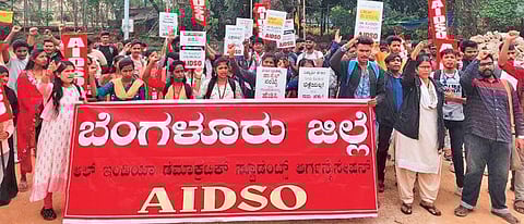 Students, under the aegis of All India Democratic Students Organisation, stage a protest in Bengaluru on Friday | Express