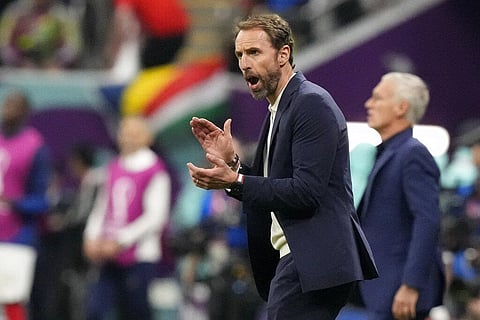 England's head coach Gareth Southgate applauds during the World Cup quarterfinal fixture between England and France, at the Al Bayt Stadium in Al Khor, Dec. 10, 2022. (Photo | AP)