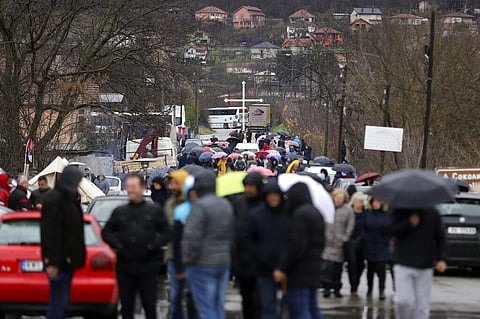 Local Serbs block the road near the village of Rudare, north of Serb-dominated part of ethnically divided town of Mitrovica, Kosovo, Sunday, Dec. 11, 2022. (Photo | AP)