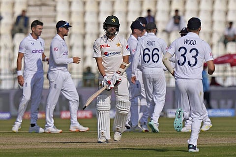 Pakistan's Abrar Ahmed walks off the field after his dismissal during the fourth day of the second test match between Pakistan and England, in Multan, Dec. 12, 2022. (Photo | AP)