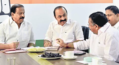State Congress president K Sudhakaran having a chat with UDF convenor M M Hassan before the party’s political affairs committee meeting in Kochi on Sunday. (Photo | Express)