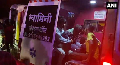 bus carrying 48 students overturned in the Khopoli PS area of Raigad district. (Photo | Twitter, ANI)