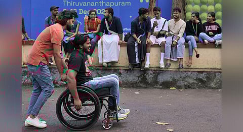 Delegates in front of Tagore Theatre on the fourth day of IFFK. (Photo | B P Deepu, EPS)