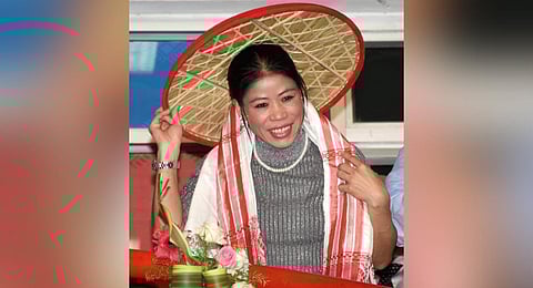 Olympian boxer MC Mary Kom felicitated with a traditional Assamese Japi (hat) and Gamocha (towel). (File Photo | PTI)