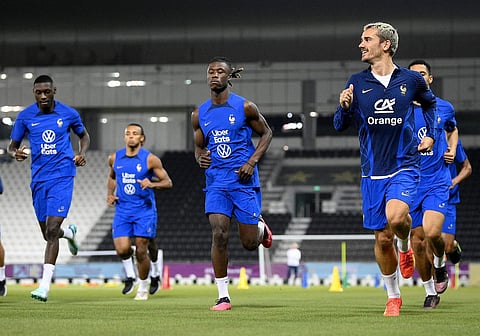 Antoine Griezmann (Right): Rejected once, smiling and content now.