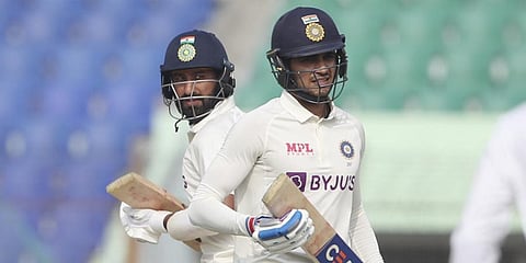 Cheteshwar Pujara right and Shubman Gill runs between wickets.(Photo | AP)