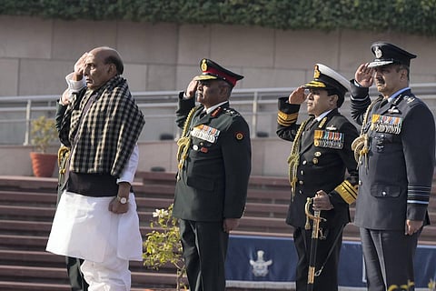 Rajnath Singh with Army Chief General Manoj Pande, CDS General Anil Chauhan, Air Chief Marshal VR Chaudhari pays tribute at the National War Memorial on the occasion of Vijay Diwas. (Photo | PTI)
