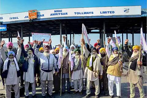 Farmers part of KMSC raise slogans during a protest to press their various demands including farm debt waiver, remunerative prices for their crops and compensation for damage to crops. (Photo | PTI)