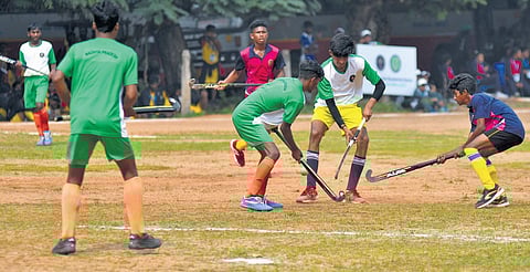 Players from Andhra and Madhya Pradesh participating in hockey competition during Nat’l Sports Meet. (Photo | Prasant Madugula, EPS)
