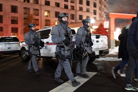 York Regional Police tactical officers work the scene of a fatal shooting in Vaughan, Ontario on Dec. 18, 2022 (Photo | AP)