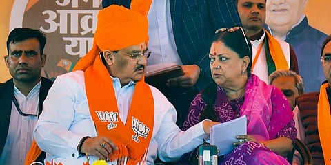 BJP National President JP Nadda with former Rajasthan chief minister Vasundhara Raje during the party's 'Jan Aakrosh Yatra'. (Photo | PTI)