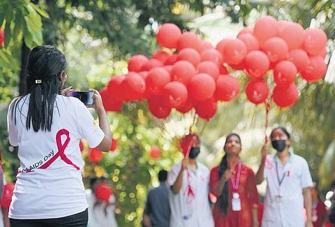 Students spreading awareness on AIDS at health and family welfare training centre in Chennai on Thursday. (Photo| R Satish Babu, EPS)