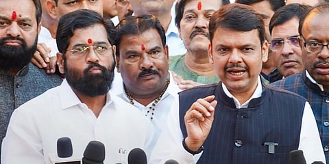 Maharashtra CM Eknath Shinde, (L), and Deputy CM Devendra Fadnavis at a press conference in Nagpur, Dec. 20, 2022. (Photo | PTI)