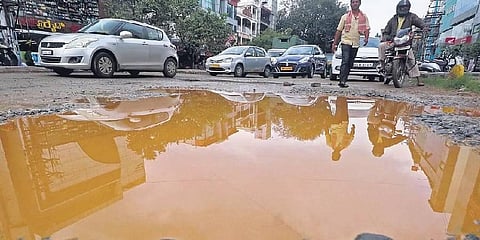 A huge pothole in NGEF Layout, near Nagarabhavi, on Monday | Shashidhar Byrappa