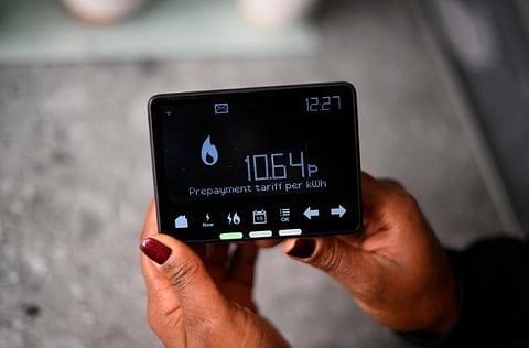 Samantha Pierre-Joseph shows her smart meter indicating that she is on a 'Prepayment tariff', in her house in London. (Photo | AFP)