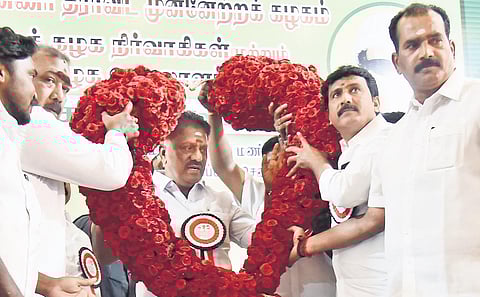 OPS being garlanded at AIADMK district secretaries’ meet in Chennai | P Jawahar