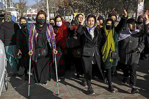 Afghan women chant slogans during a protest against the ban on university education for women, in Kabul, Afghanistan. (Photo | AP)