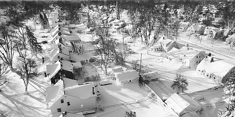 In this drone image, snow blankets a neighborhood, Sunday, Dec. 25, 2022, in Cheektowaga, New York.(Photo | AP)