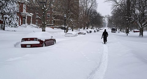 Along with drifts and travel bans, many streets were impassible due to abandoned vehicles. (Photo | AP)