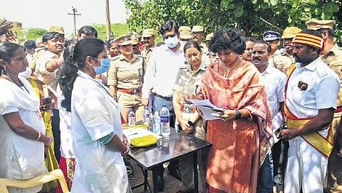 Following reports of human excreta in Vengaivayal water tank, Collector Kavitha Ramu and SP Vandita Pandey visited the village and ordered inquiry | M Muthu Kannan
