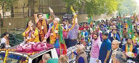 I&B Minister Anurag Thakur at a BJP roadshow in New Delhi on Friday | pti