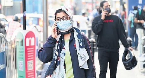 People wearing masks seen on Brigade Road on Thursday, as Bengaluru gears up to tackle the Covid-19 scare | nagaraja gadekal
