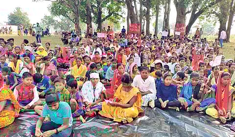 Tribals including women and children staging protest at Kamarpalli | Express