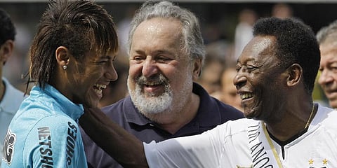Football player Neymar, left, and Brazalian football legend Pele, share a laugh during a centennial anniversary celebration of the team in Santos, Brazil. (File Photo | AP)