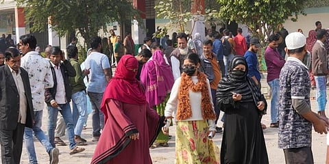 Voters after casting their votes for the Municipal Corporation of Delhi (MCD) elections, at a polling station in Jahangirpuri area. (Photo |PTI)
