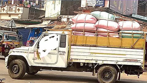 A trader transporting paddy in a pickup van at Sheragada in Ganjam | express