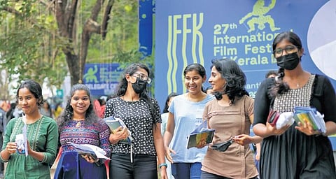 Delegates after collecting the festival kits and passes at Tagore Theatre, the main venue Pics | B P Deepu