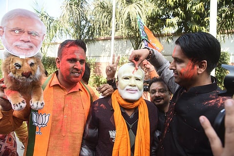 BJP supporters celebrating the victory in the Gujarat assembly election at the BJP headquarters in New Delhi. (Photo | Parveen Negi, EPS)