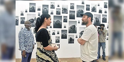 Ernakulam District Collector Renu Raj interacts with Turkish artist Alper Aydin at Aspinwall House, the main venue of the Kochi-Muziris Biennale in Fort Kochi.(Photo | A Sanesh)
