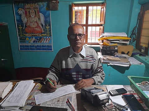 D.K Ranganath, Branch Postmaster, Dasanur branch post office in Mysuru district opened a record number of savings account in a single day. (Photo | Special Arrangement)