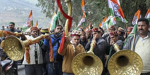 Congress workers celebrates the party's victory in Himachal Pradesh Assembly elections, in Kullu. (Photo | PTI)