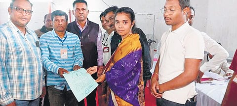 BJD’s Barsha Singh Bariha being presented the certificate of election on Thursday