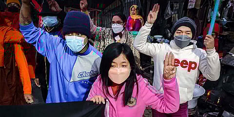 Youth activists flash the three-finger protest gesture during an anti-military government protest rally in Mandalay. (Photo| AP)