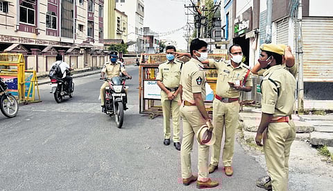 Police provide security to APNGO office in view of teachers unions’ protest against employees’ union leaders in Vijayawada on Wednesday I P Ravindra Babu