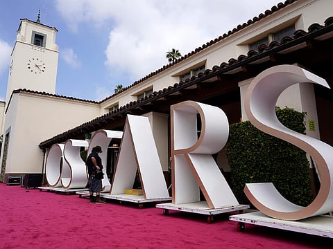 The Oscars will return to its traditional setting and also will not require in-person attendees to provide proof of vaccination against COVID-19.
