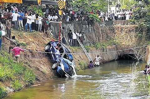The car involved in the accident being lifted from the canal in Adoor on Wednesday | Express