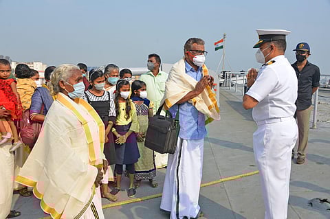 Ammini Amma being received by a Navy officer (Photo | Special arrangement)