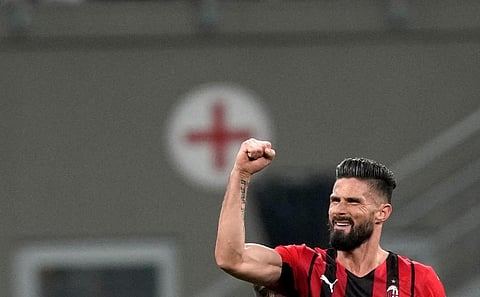 AC Milan's Olivier Giroud celebrates after scoring his side's second goal during the Italian Cup quarter final match between AC Milan and Lazio at the San Siro stadium, in Milan, Italy. (Photo | AP)