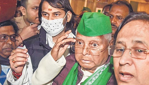 RJD chief Lalu Prasad with elder son Tej Pratap after a meeting in Patna | Pti